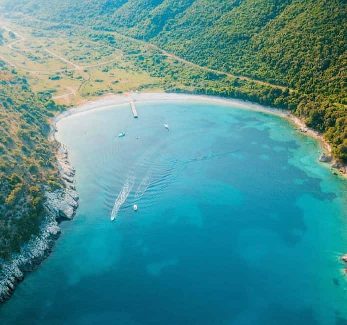 Explore Top Beaches in 6 HoursFree Drink&Umbrella Included! - Discovering the Coastal Charm of Saranda on a Boat