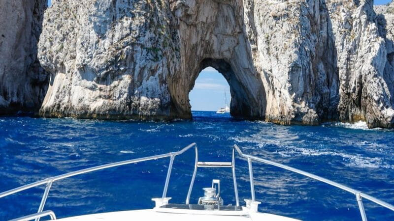 From Amalfi: private boat tour of the Amalfi Coast and Capri - Sailing Under Capris Famous Faraglioni Rocks