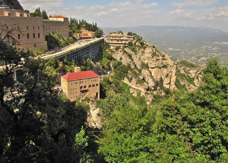 From Barcelona: Montserrat Full-Day Guided Tour - Exploring the Monastery: Architecture and Spiritual Significance