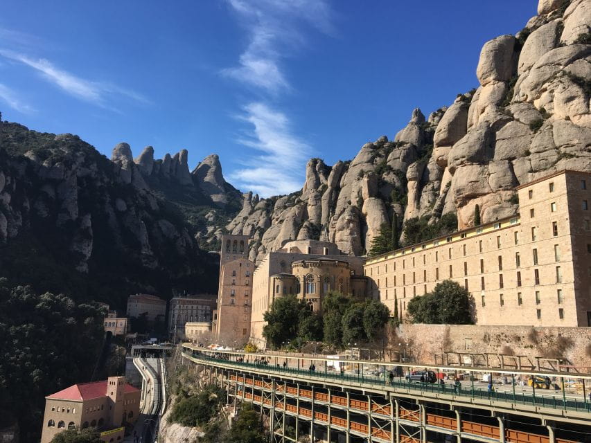 From Barcelona: Montserrat Monastery & Scenic Mountain Hike - Itinerary Highlights