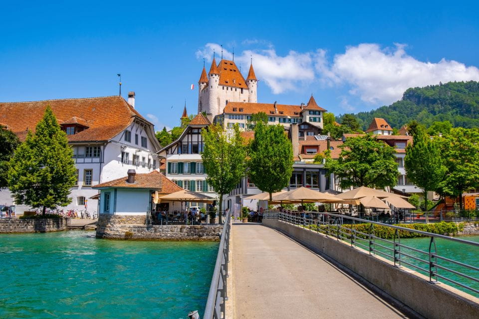 From Interlaken: Beatus Caves, Blue Lake and Lake Thun Tour - Sigriswil Suspension Bridge