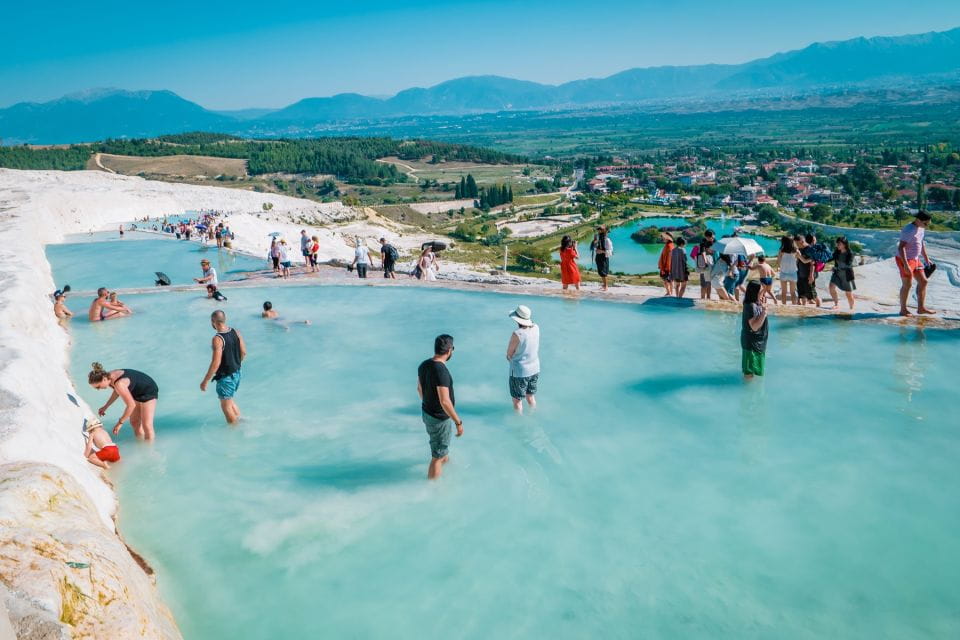 From Kusadasi: Pamukkale & Hierapolis Guided Tour With Lunch - Taking in Thermal Pool Bliss
