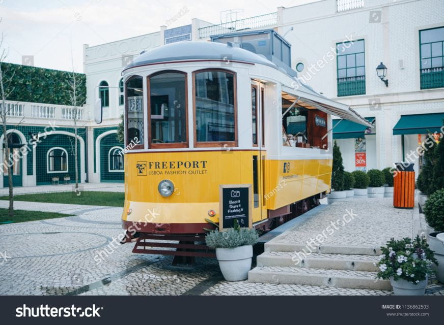 From Lisbon: Round-trip Shuttle to Freeport Fashion Outlet - Top Brands at the Outlet