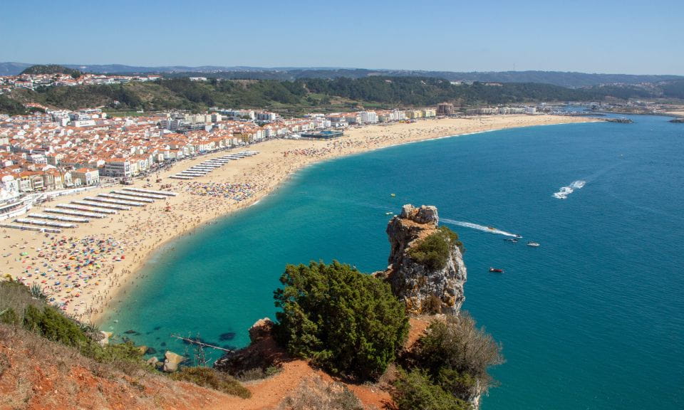 From Porto: Private Transfer to Lisbon With Stop at Nazaré - Sampling Fresh Seafood