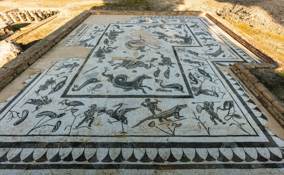 From Seville: Italica Roman City & Medieval Monastery Tour - Highlights of Italica