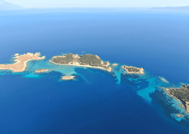 From Thessaloniki: Blue Lagoon & Ammoulliani Cruise - Lunch and Leisure at Banana Beach