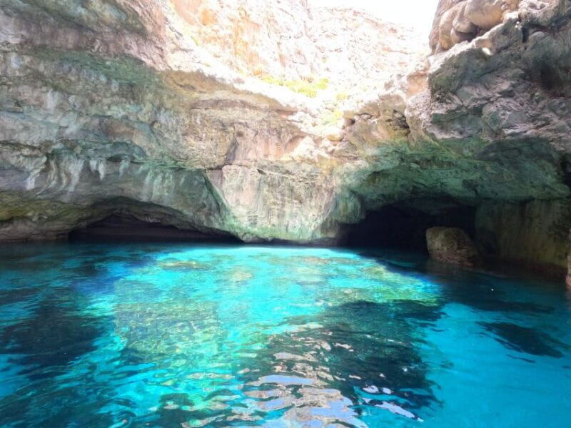 From Trapani: Marettimo Grottos Cruise & Local Food Tastings - Entering the Caves: A Close-Up of Natures Sculptures