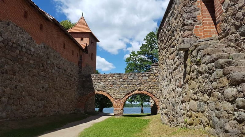 From Vilnius: Trakai Castle and Paneriai Memorial Tour - Entering The Heart of Lithuanian History: Paneriai Memorial Park