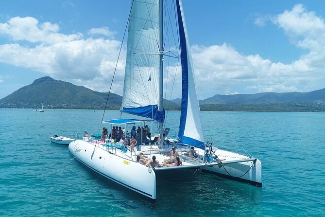 Full Day Catamaran Cruise on Shared Basis to Bénitiers Island - Booking and Pricing Info