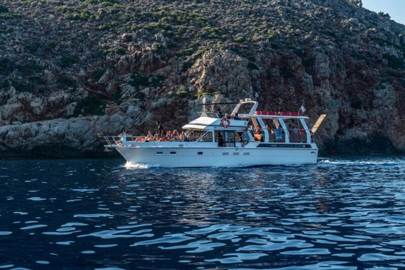 FULL DAY GROUP TOUR KOUTSOMITI KOUNOUPA & RED ROCK WITH MEAL - Exploring Astypalaia’s Hidden Coastal Gems: A Full-Day Boat Adventure