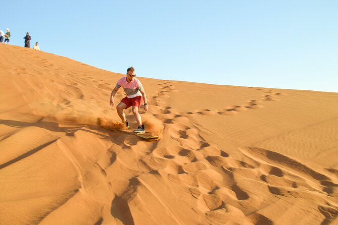 Full-Day Guided Red Dunes Desert Tour in Dubai With Camel Ride - Falcon Experience Photos