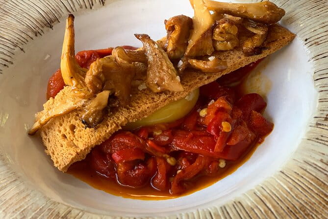 Full-day private Bilbao tour (Guggenheim museum & full pintxo lunch included) - Crossing Landmarks: Puente Zubizuri and the New Bilbao