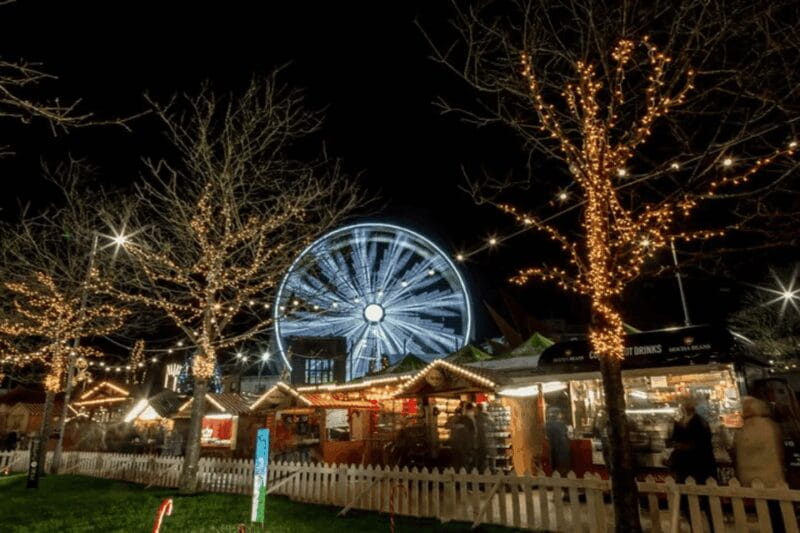 Galway: Christmas Market and City Highlights Walking Tour - The Spanish Arch: Riverside Charm and Evening Reflections