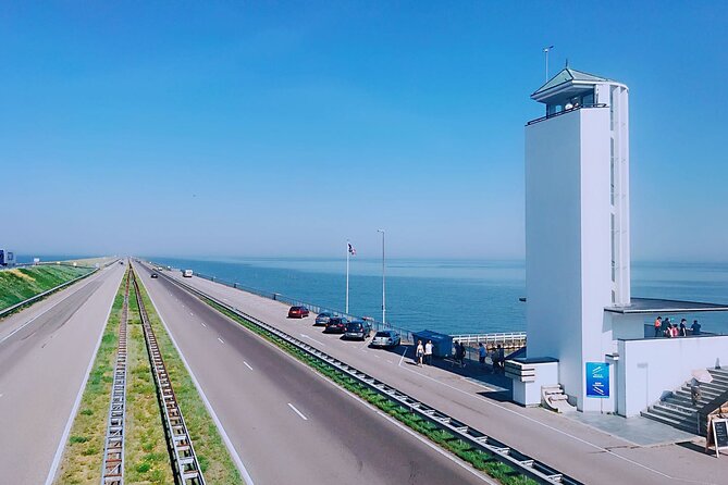 Giethoorn, Afsluitdijk, Zaanse Schans Day Tour Mini VIP Bus Incl. Hotel Pick Up - Peaceful Giethoorn Boat Cruise