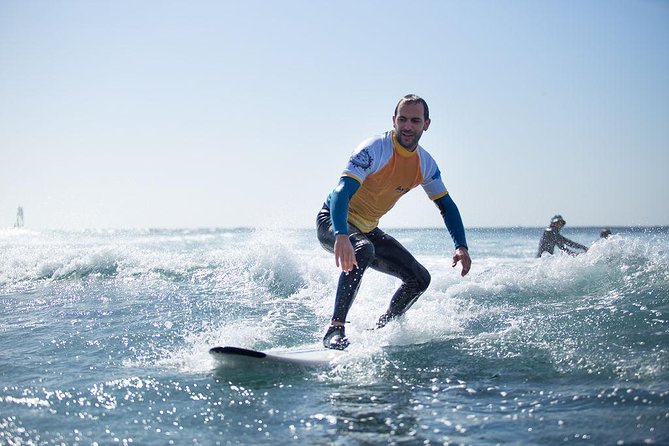 Group Surf Lessons - Instructor Adapts to Ability Levels
