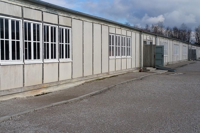 Guided Dachau Concentration Camp Memorial Site Tour With Train From Munich - Group Size and Cancellation