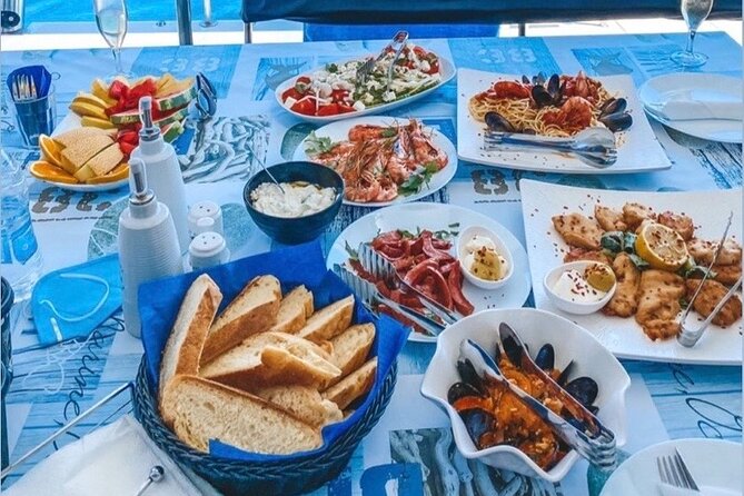 Half-Day Exclusive Catamaran Cruise in Santorini With Meal and Open Bar - Traveler Reviews and Ratings