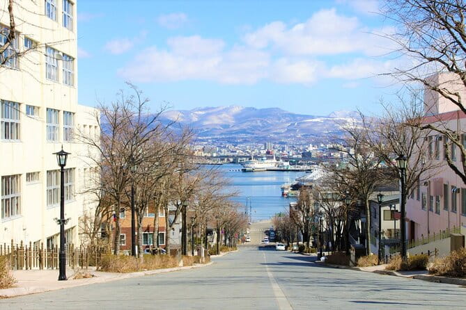 Hokkaido Hakodate Cherry Blossom 2D1N Bus Tour From Sapporo - Meeting and Pickup