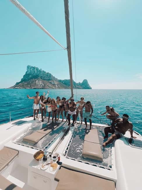 IBIZA: CATAMARAN CUEVAS CALA BASSA AND PLAYA CALA CONTE SUP PADDLE&SNORKEL - Discover Ibiza from a Unique Perspective: The Catamaran Experience