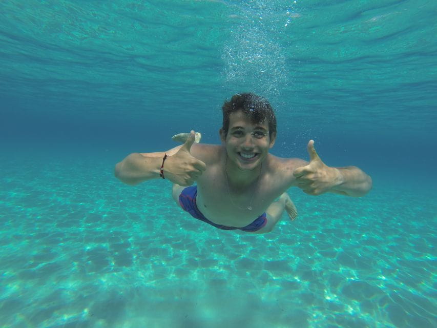 Ibiza: Cave and Beach Hopping Private Boat Tour - Cruising Through Cala Conta