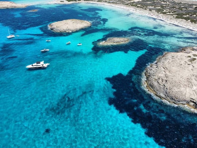 Ibiza: Formentera Boat Cruise with Paddle, Snorkel & Lunch - Entering the Scenic Waters of Ibiza and Formentera