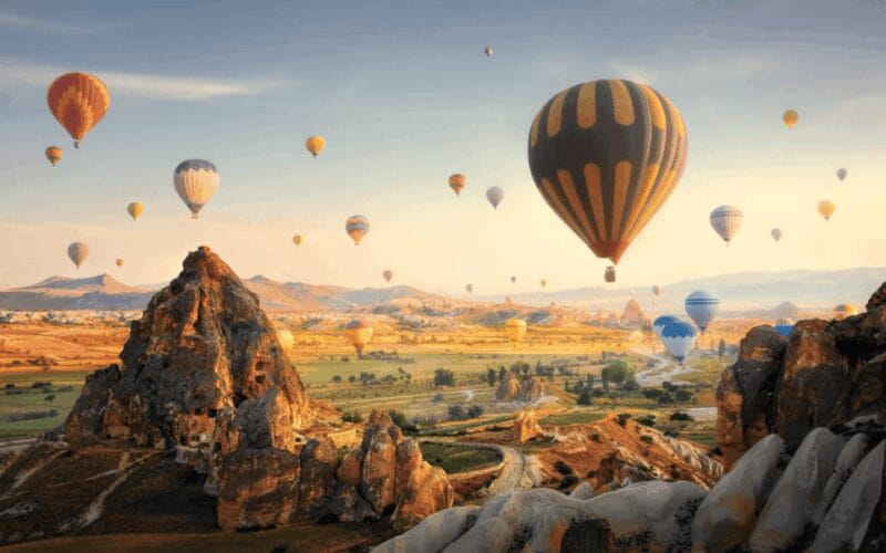 Journey to Cappadocia: Balloon Ride and Red Tour Package - Experiencing Cappadocia: From the Sky to the Valleys