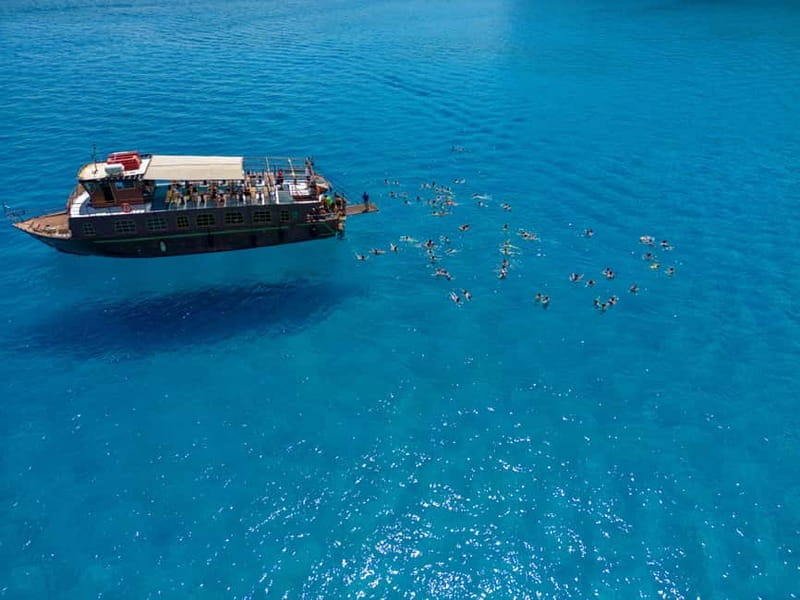 Kolympia : Transfer & Cruise to Lindos with 3 Swimming Stops - The Boat & Crew: Comfort, Service, and Authentic Charm