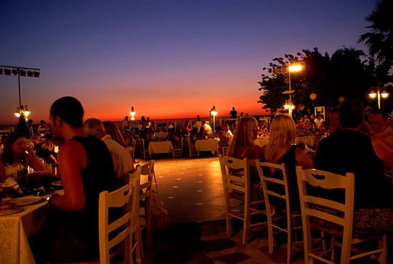 Kos: Greek Dinner with Music, Dancing, and Unlimited Wine - Key Points / Takeaways