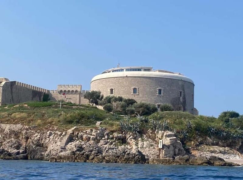 Kotor: Our Lady of the Rocks and Blue Cave Group Boat Tour - Cold War Tunnels and the Former Prison: A Surprising History Lesson