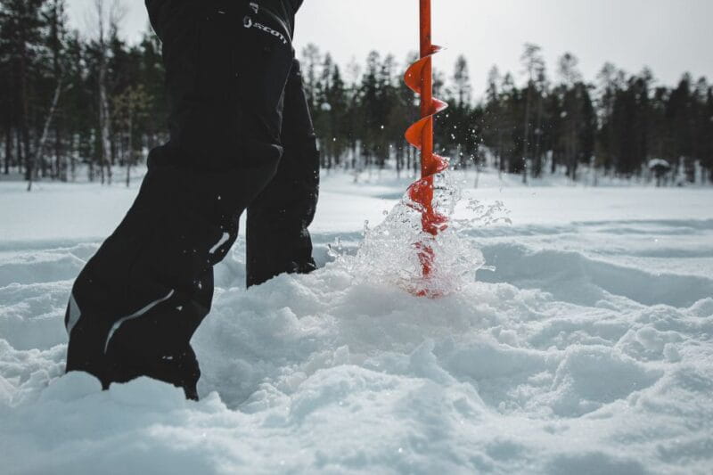 Levi: Finnish Ice Fishing Tour by Car - The Hot Drink and Campfire Atmosphere