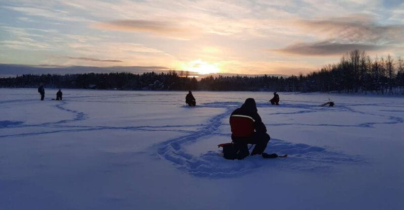 Levi Lapland: Arctic Ice-Fishing - Toasting and Warm Breaks at the Campfire