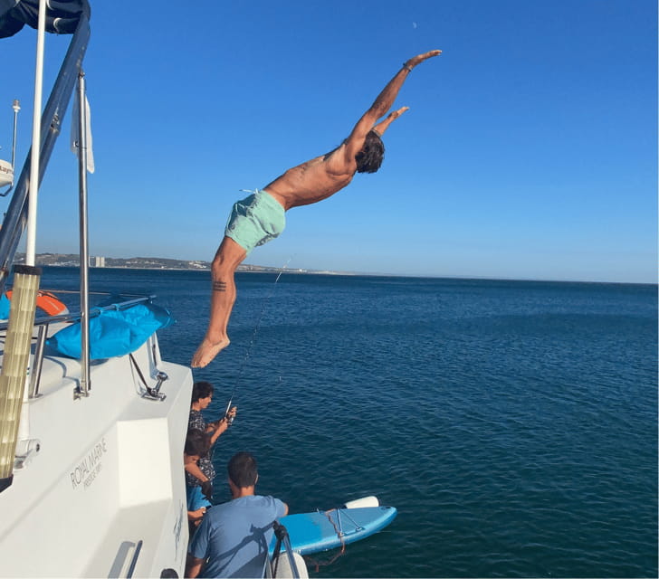 Lisbon: 3H Private Luxury Catamaran Tour with Swimming - The highlights: Sun, swimming, and onboard treats