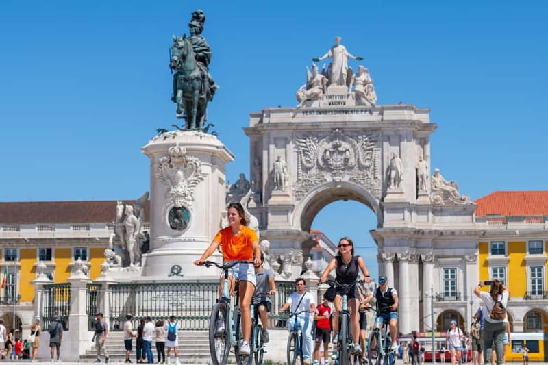 Lisbon: Bike Tour from Lisbon to Belém + Liquor & Pastry - Entering Lisbon’s Vibrant Streets: A Downhill Delight