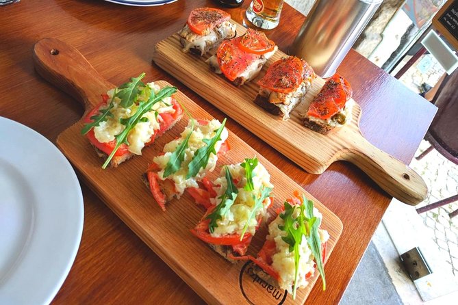 Lisbon Small-Group Food Tour With 18 Tastings in Alfama District - Highlights of the Alfama District