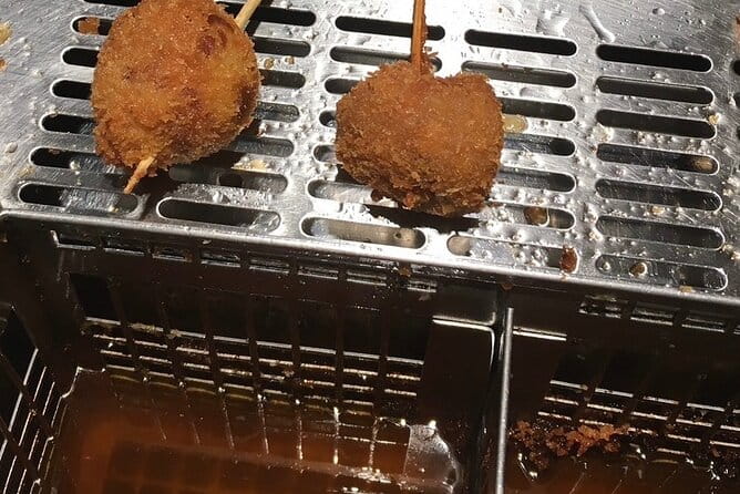 Local Izakaya Japanese Traditional Bar Hopping in Osaka Namba - Navigating the Tour Logistics and Participant Requirements