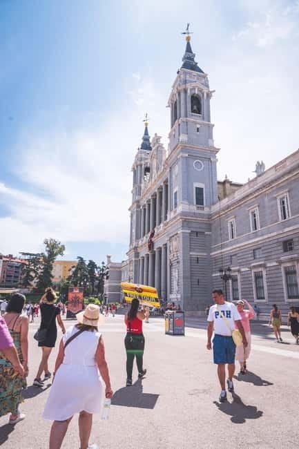 Madrid Essential Walking Tour with Churros, Drink & Market - Key points / Takeaways