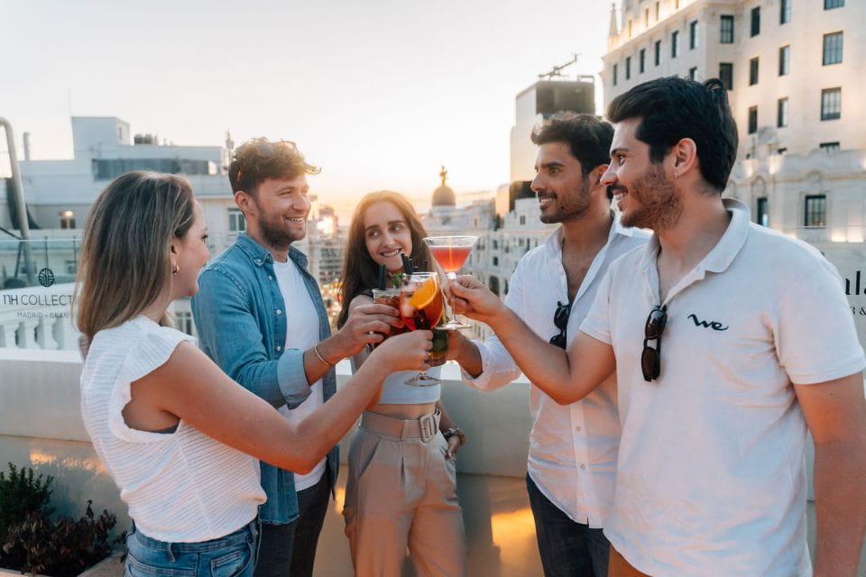 Madrid: Guided Tapas and Wine Tour With Terrace Visit - Rooftop Cocktail Experience
