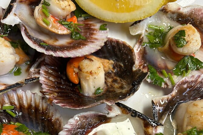 Madrid Local Tapas Tour with Private Dinner and Bottomless Wine - Walking Through the Literary Quarter: A Glimpse of Historic Madrid