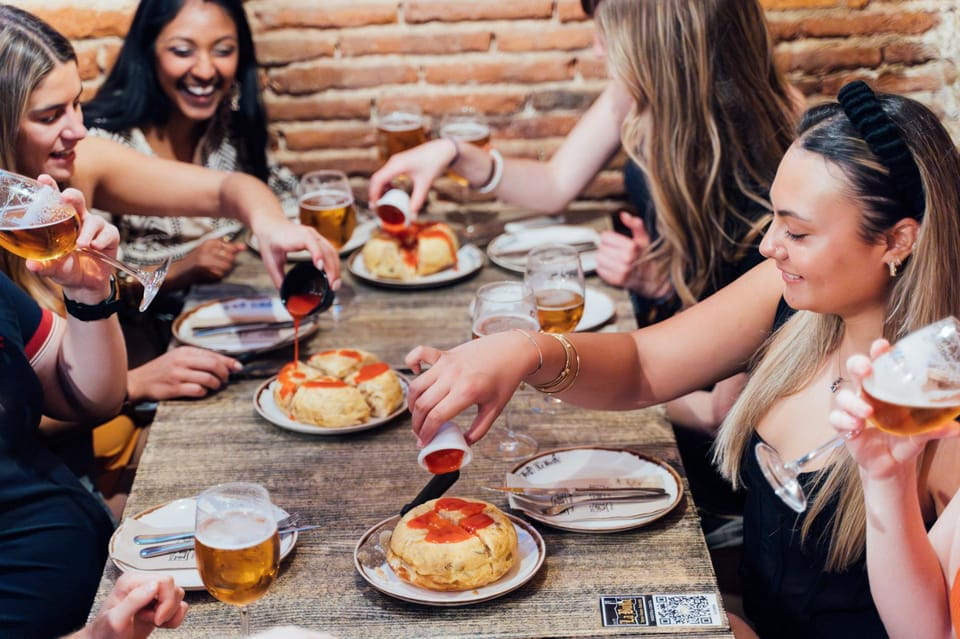 Madrid: Tapas Crawl Food Tour With 6 Tapas and 4 Drinks - Experience and Highlights