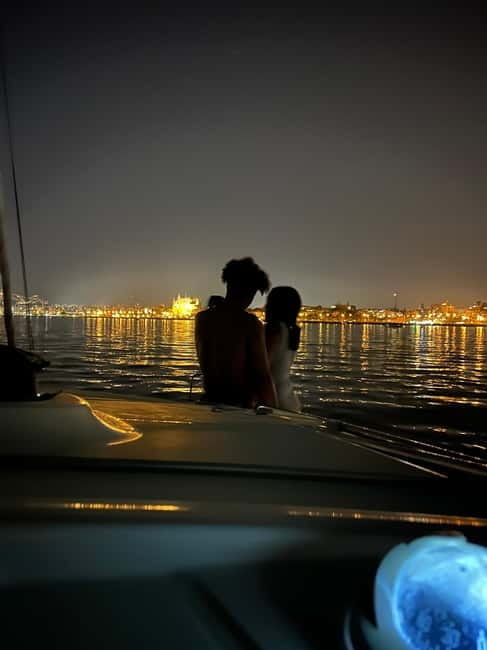 Majorca: Dinner aboard a private catamaran with snorkeling and paddle surfing - What It’s Like to Snorkel and Paddle in Mallorca’s Crystal Waters