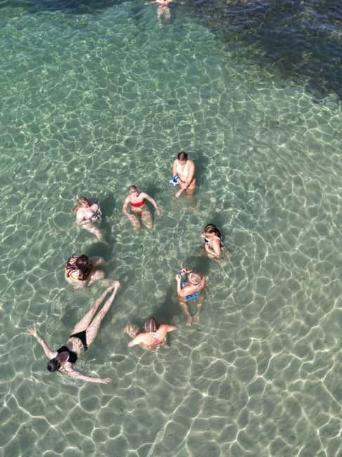 Majorca: Dinner aboard a private catamaran with snorkeling and paddle surfing - Enjoying the Sunset and Dinner: A Meal With a View