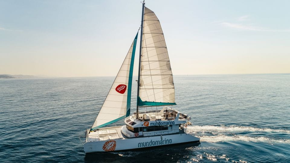 Malaga: Catamaran Sailing Cruise With Swimming & Optional DJ - Sailing Experience Highlights