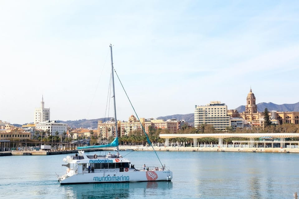 Malaga: Catamaran Sailing Cruise With Swimming & Optional DJ - Onboard Amenities and Services