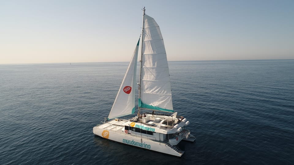 Malaga: Sailing Catamaran Sunset Cruise With Live DJ & Drink - What to Bring