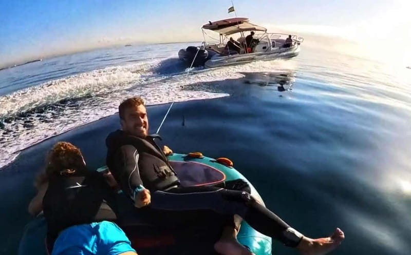 Mallorca: Private Watersports Boat. LUNCH Drinks SUP, Tubing - Key points / Takeaways