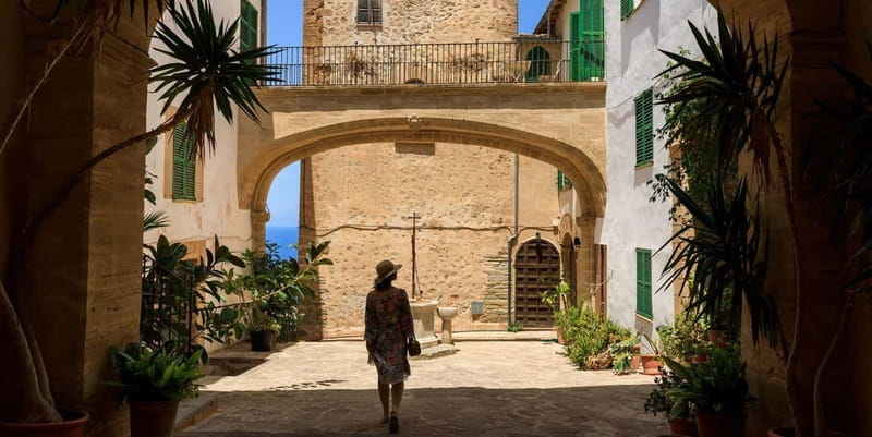 Mallorca: Unveiling the Island's Hidden Gems Guided Day Tour - Valldemossa: Village of Muslim Origins and Artistic Magnet