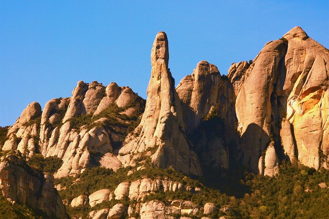 Montserrat Half Day With Cable Car and Easy Hike From Barcelona - Meeting Point and Pickup