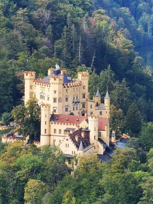 Munich: Neuschwanstein by Bus with Alpine Bike Ride & Swim - Exploring Hohenschwangau & Village Charm