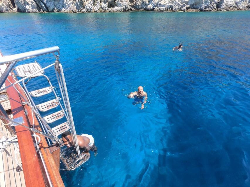 Mykonos: Delos and Rhenia Islands Cruise With BBQ Meal - Delos Island Exploration