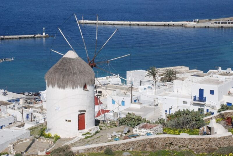 Mykonos: Half-Day City Walking Tour and Island Bus Tour - Entering Mykonos Town: Narrow Streets and Iconic Windmills